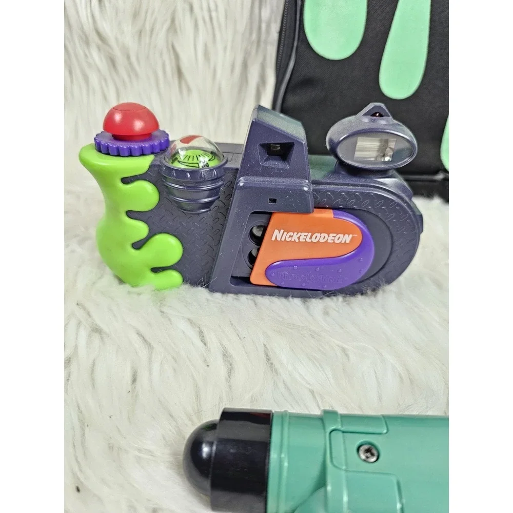 Nickelodeon Photo Blaster Camera, Slime Lunchbox, Lazer Light, and Flash Screen